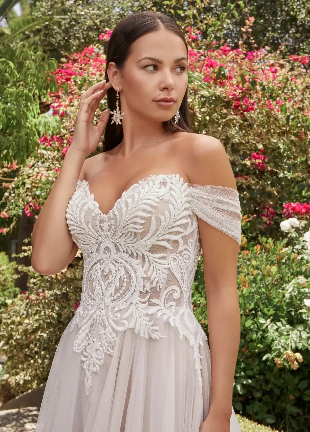 Model wearing a white Lillian West Dress