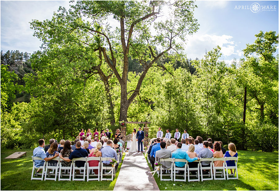 Pretty-CO-sunny-wedding-day-underneath-trees-at-Wedgewood-on-Boulder-Creek.jpg